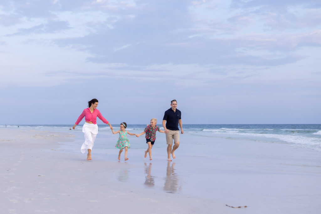 Family walking along the beach at Grayton Beach