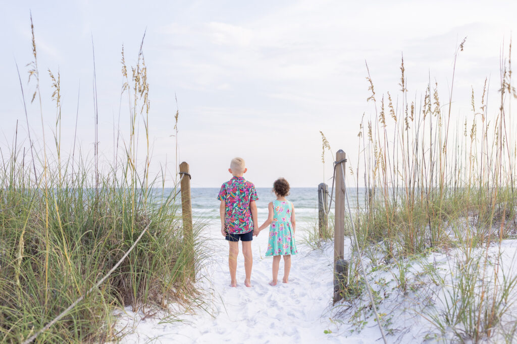 brother and sister on the beach at Grayton Beach Florida